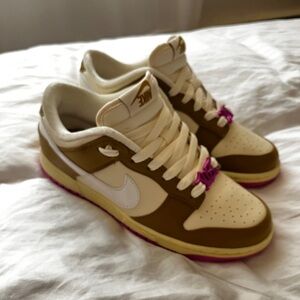 “Just Do It” Bronzine and Pink Nike Dunk Low SE